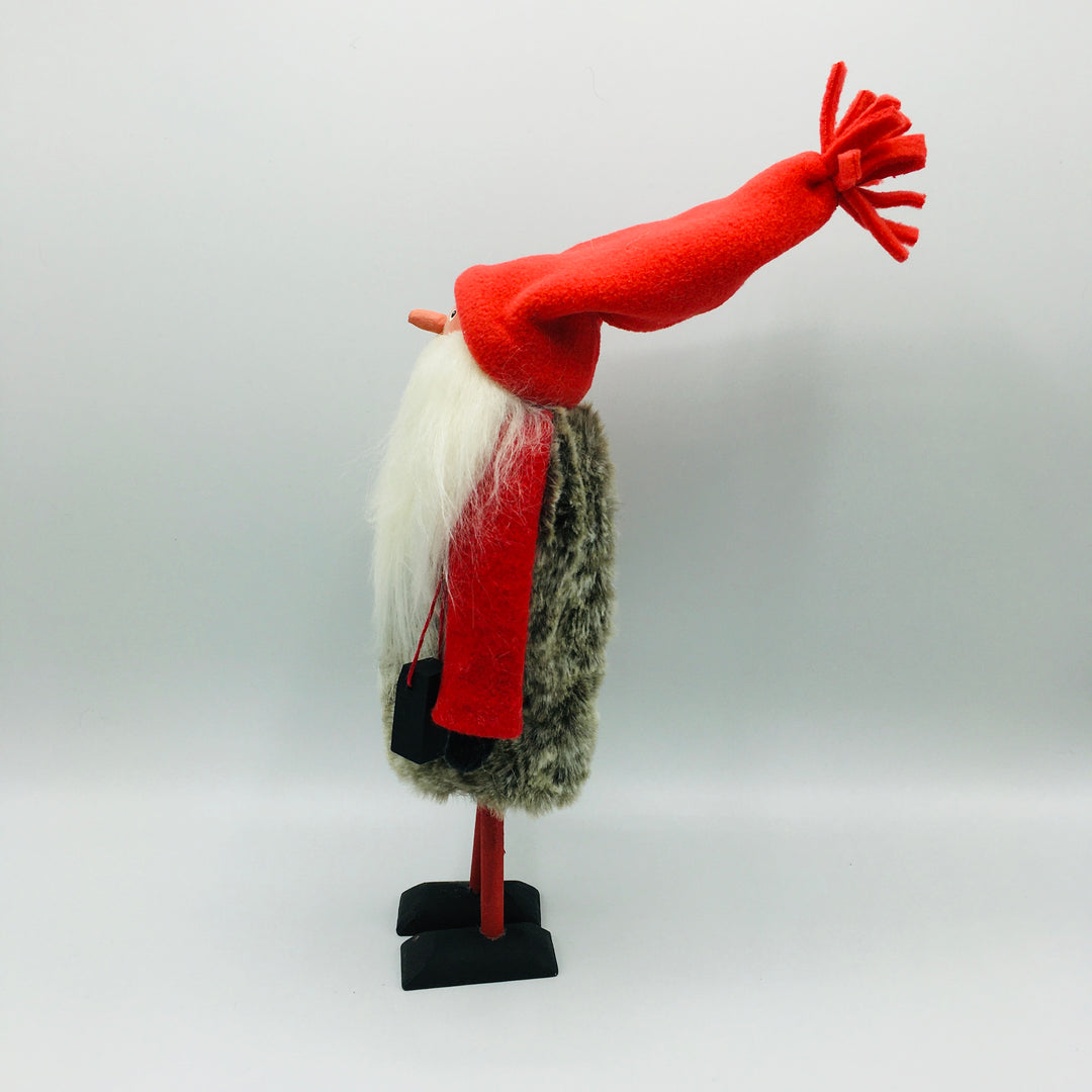 Hand made tomte holding a lantern & gift