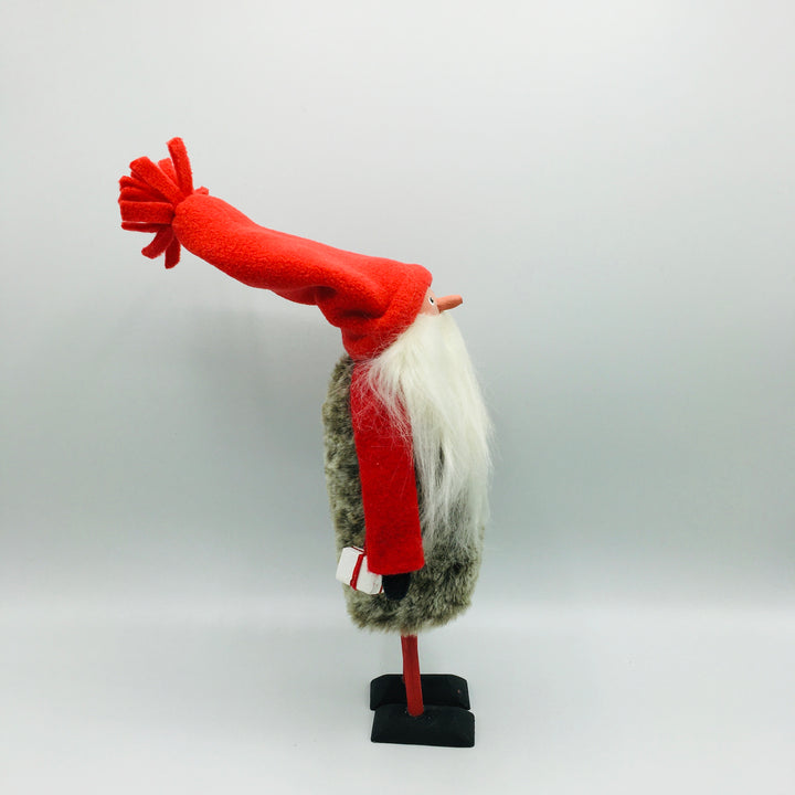 Hand made tomte holding a lantern & gift