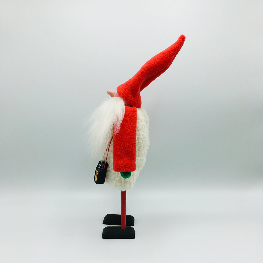 Hand made tomte holding a lantern & gift