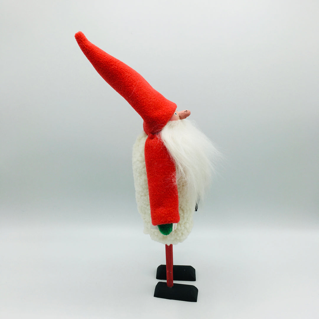 Hand made tomte holding a lantern & gift