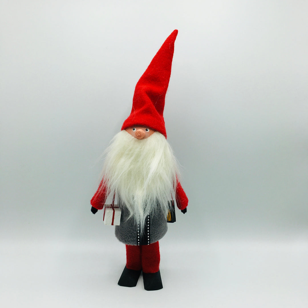 Hand made tomte holding a lantern & gift