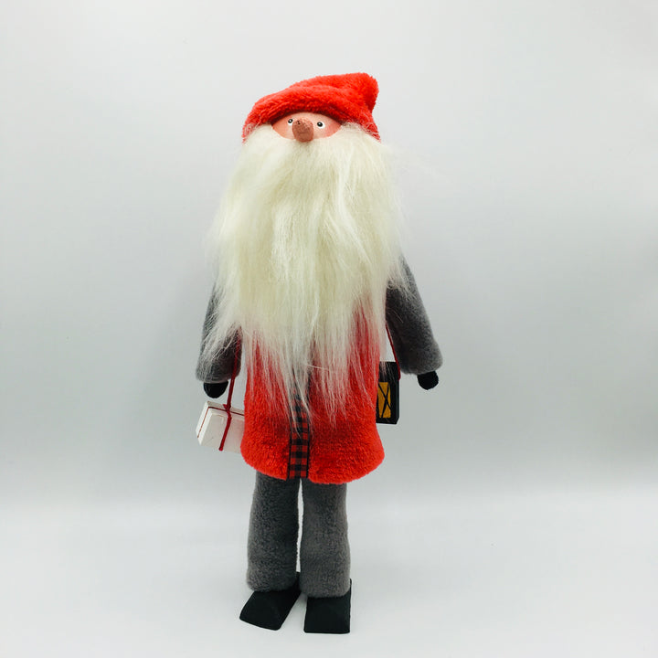 Hand made tomte holding a lantern & gift