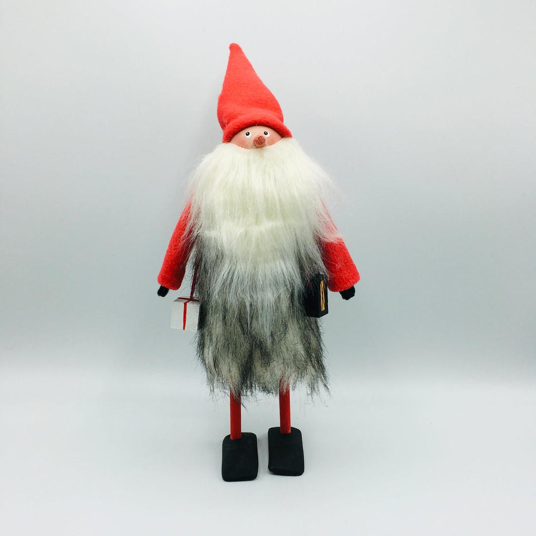 Hand made tomte holding a lantern & gift