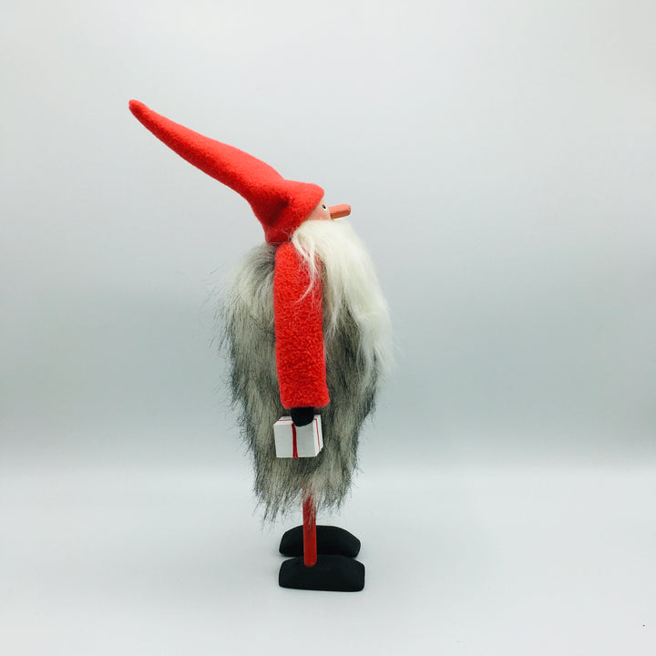 Hand made tomte holding a lantern & gift