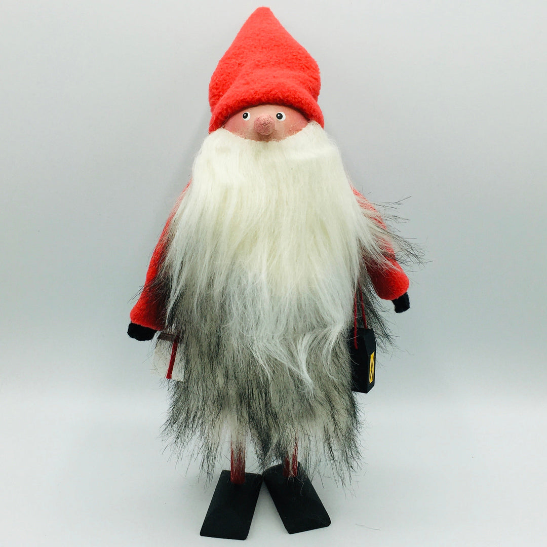 Hand made tomte holding a lantern & gift