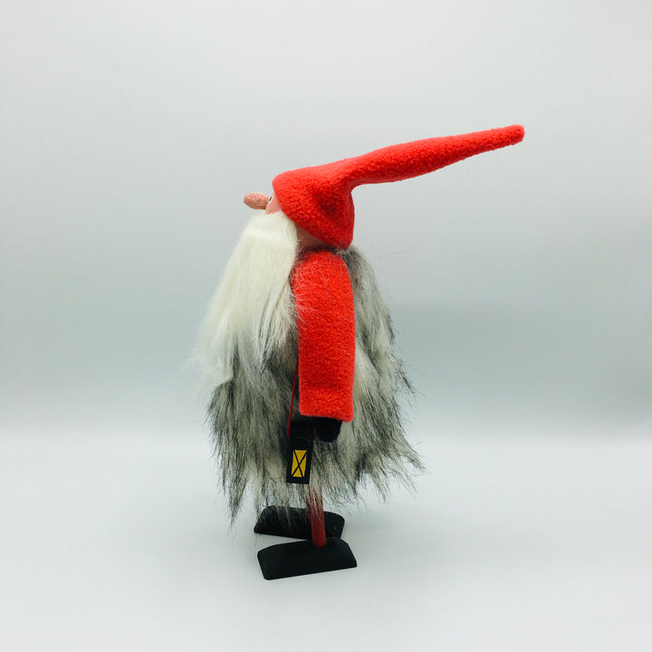 Hand made tomte holding a lantern & gift