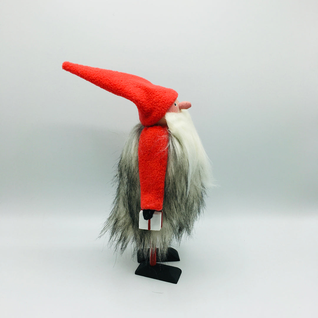 Hand made tomte holding a lantern & gift