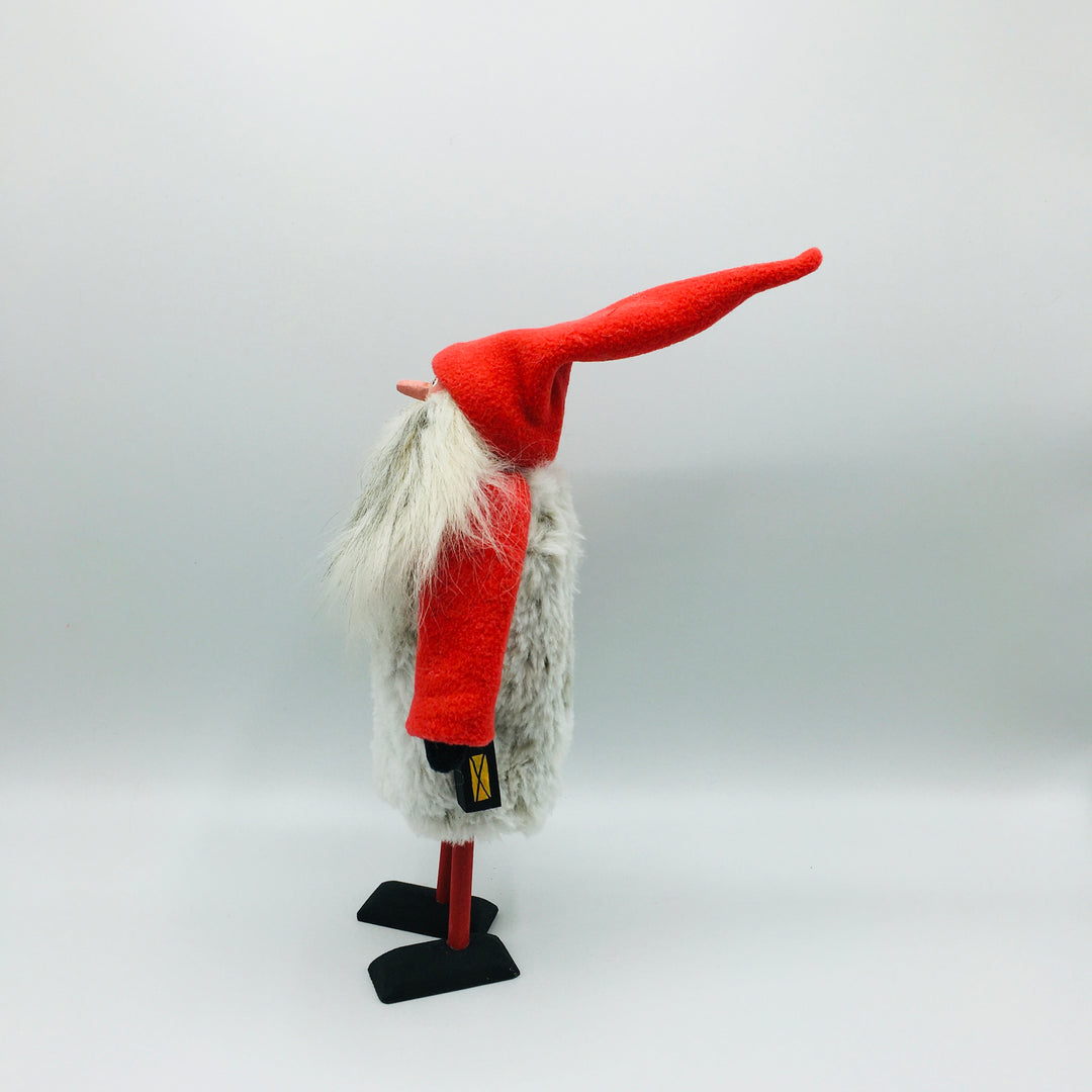 Hand made tomte holding a lantern & gift