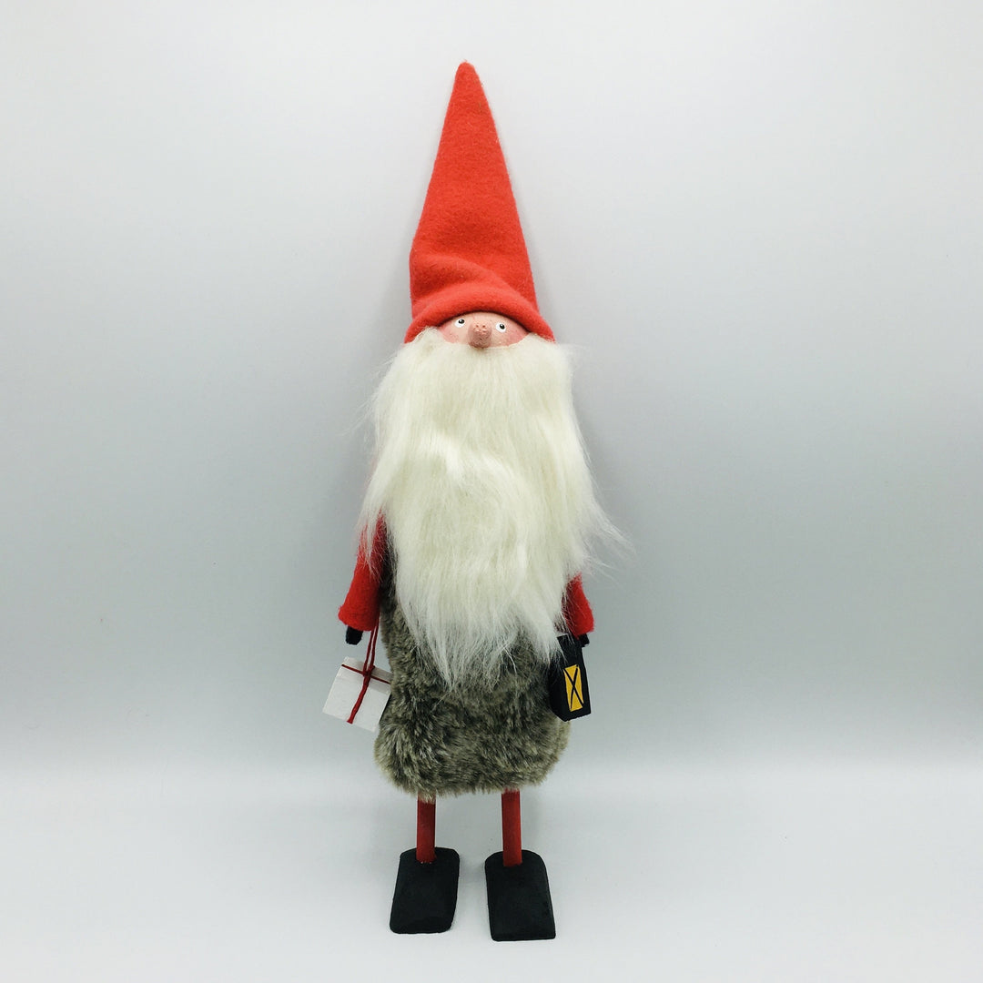 Hand made tomte holding a lantern & gift