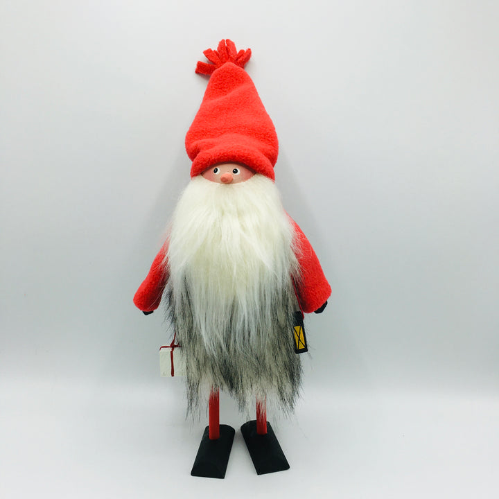 Hand made tomte holding a lantern & gift