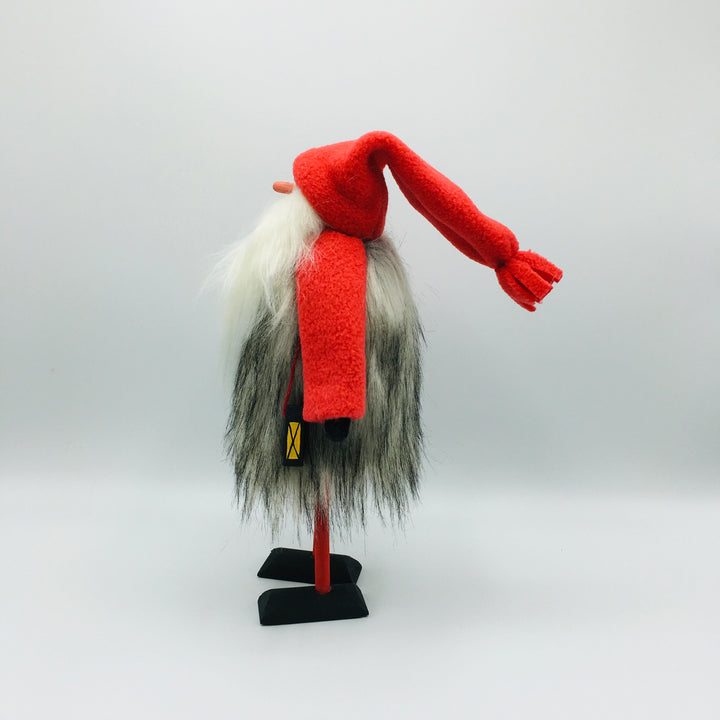 Hand made tomte holding a lantern & gift