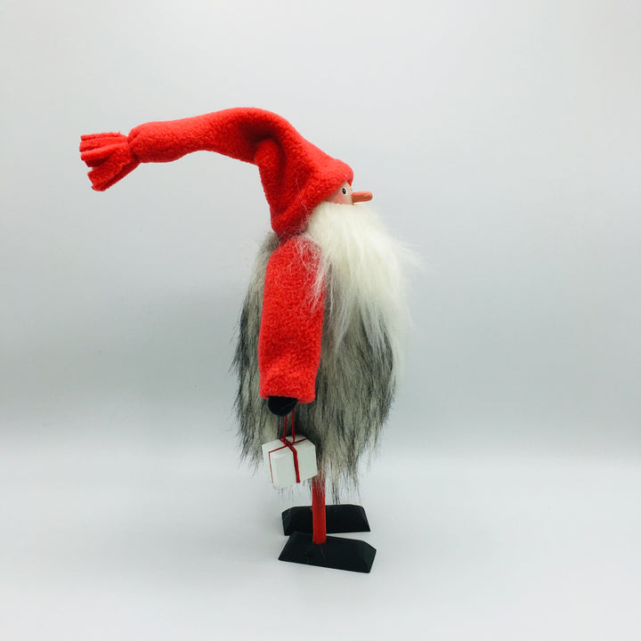 Hand made tomte holding a lantern & gift