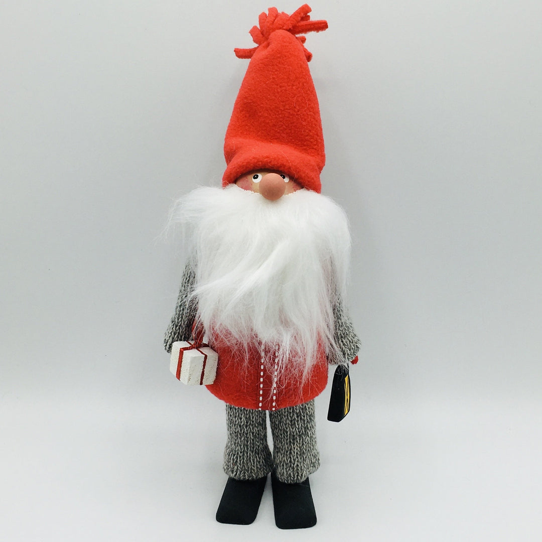 Hand made tomte holding a lantern & gift