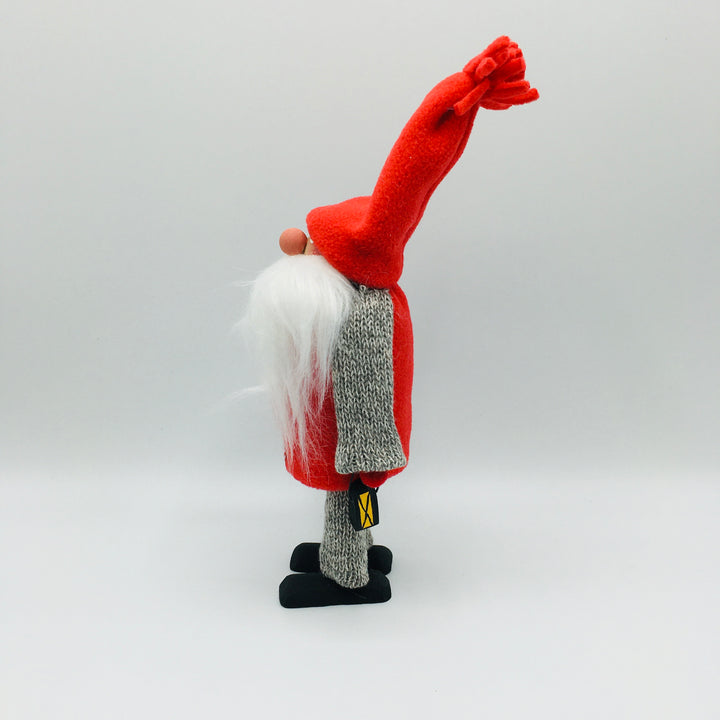 Hand made tomte holding a lantern & gift