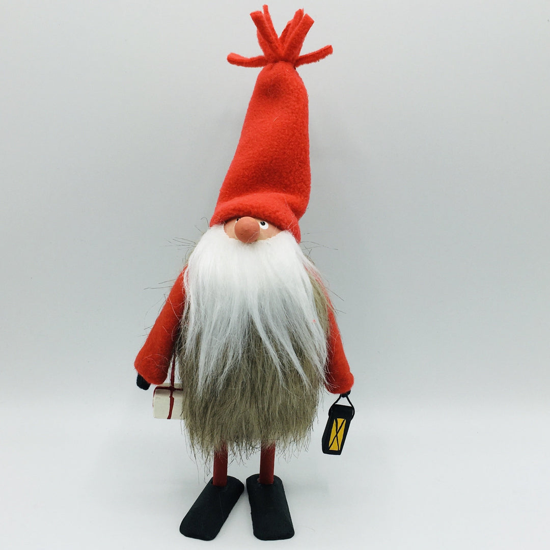 Hand made tomte holding a lantern & gift