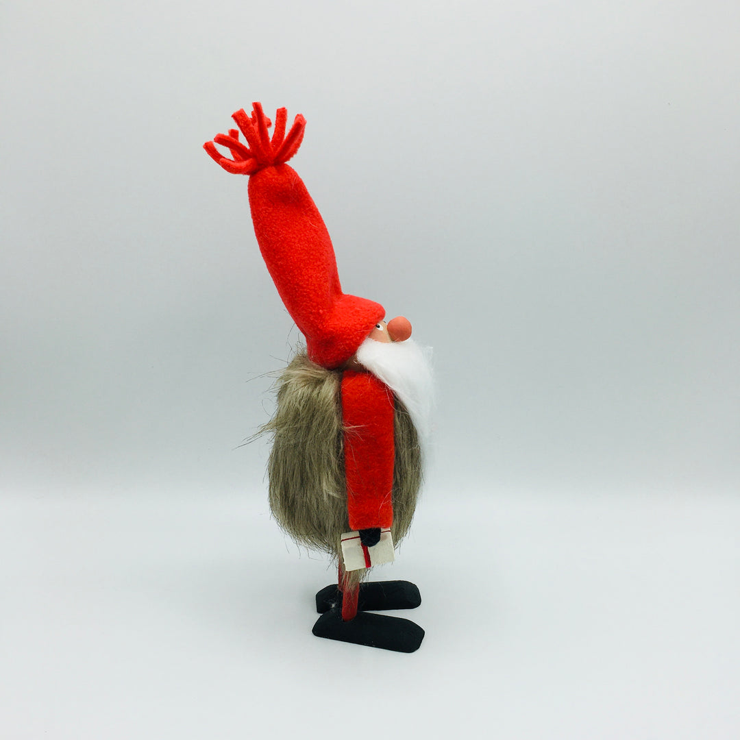 Hand made tomte holding a lantern & gift