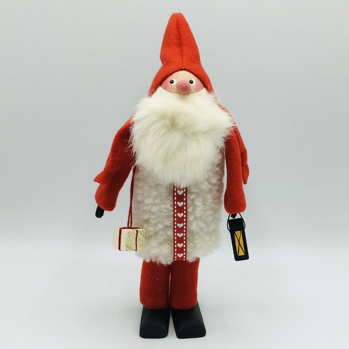 Hand made tomte holding a lantern & gift