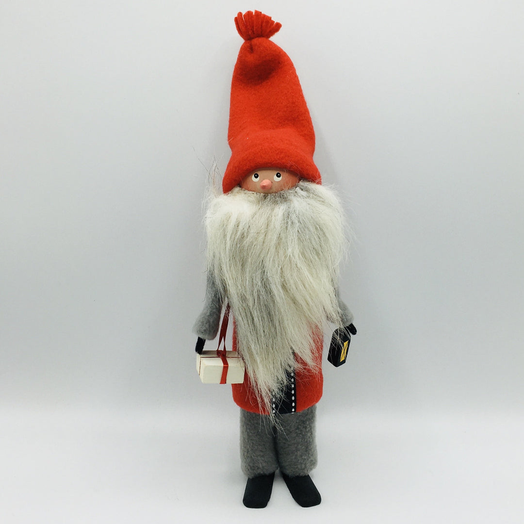 Hand made tomte holding a lantern & gift