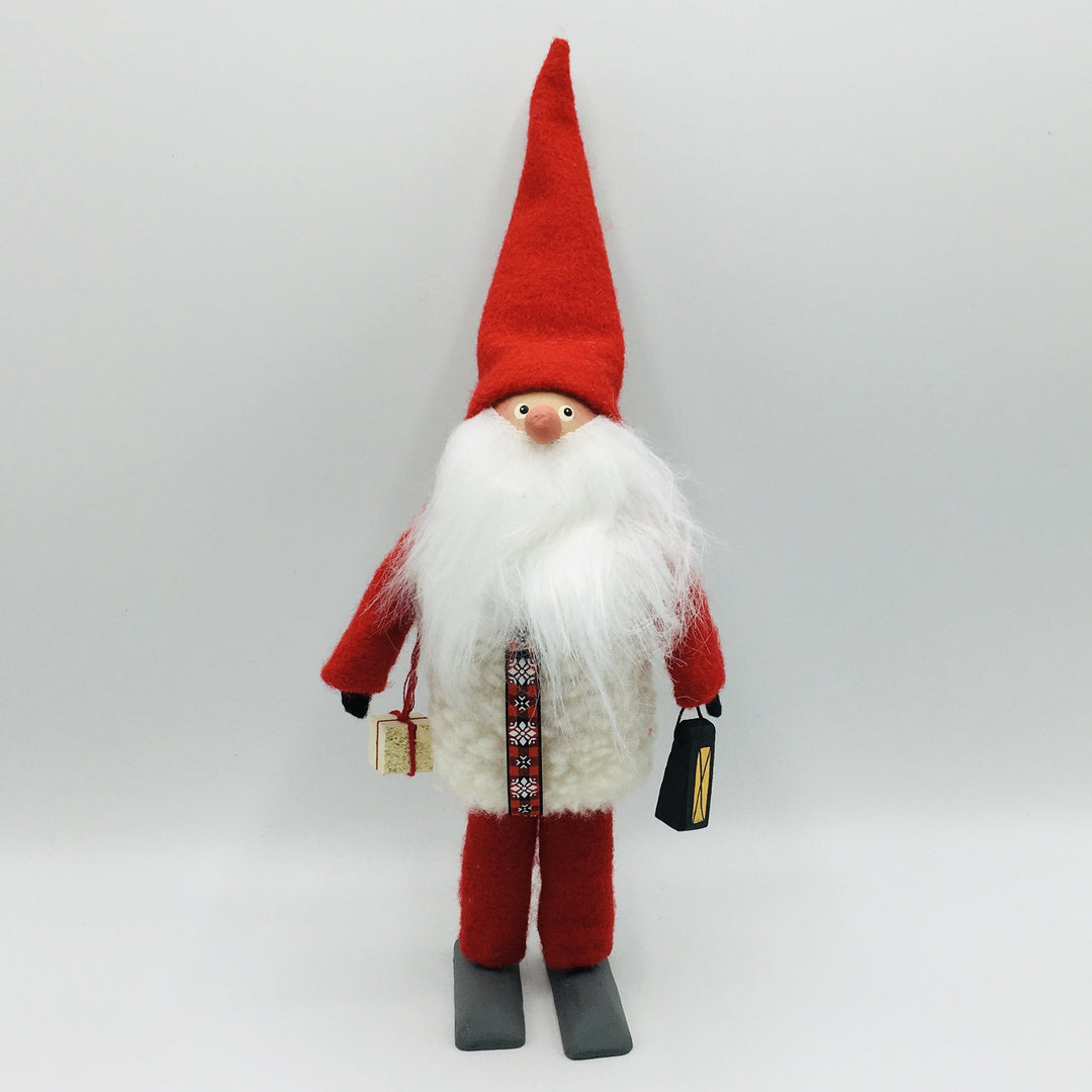 Hand made tomte holding a lantern & gift