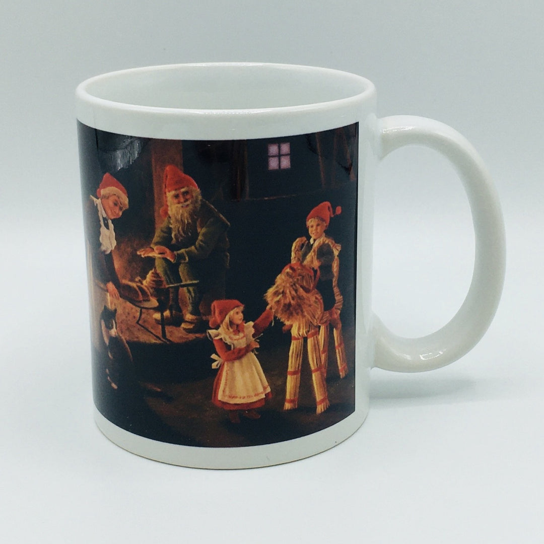 Jan Bergerlind Tomte family with straw goat coffee mug