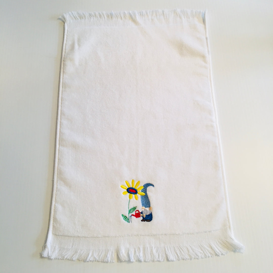 Finger tip towel - Gnome watering flower