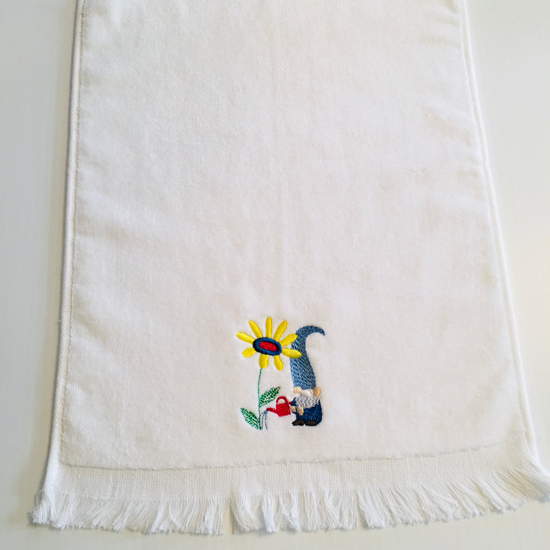 Finger tip towel - Gnome watering flower