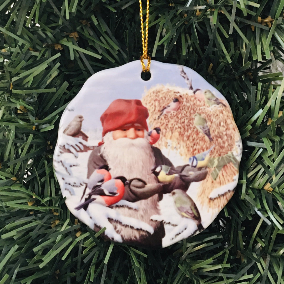 Ceramic Ornament, Jan Bergerlind Tomte feeding birds