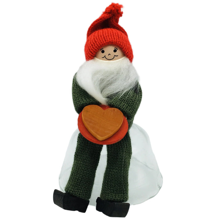 Swedish Tomte Man sitting with Cookie on plate