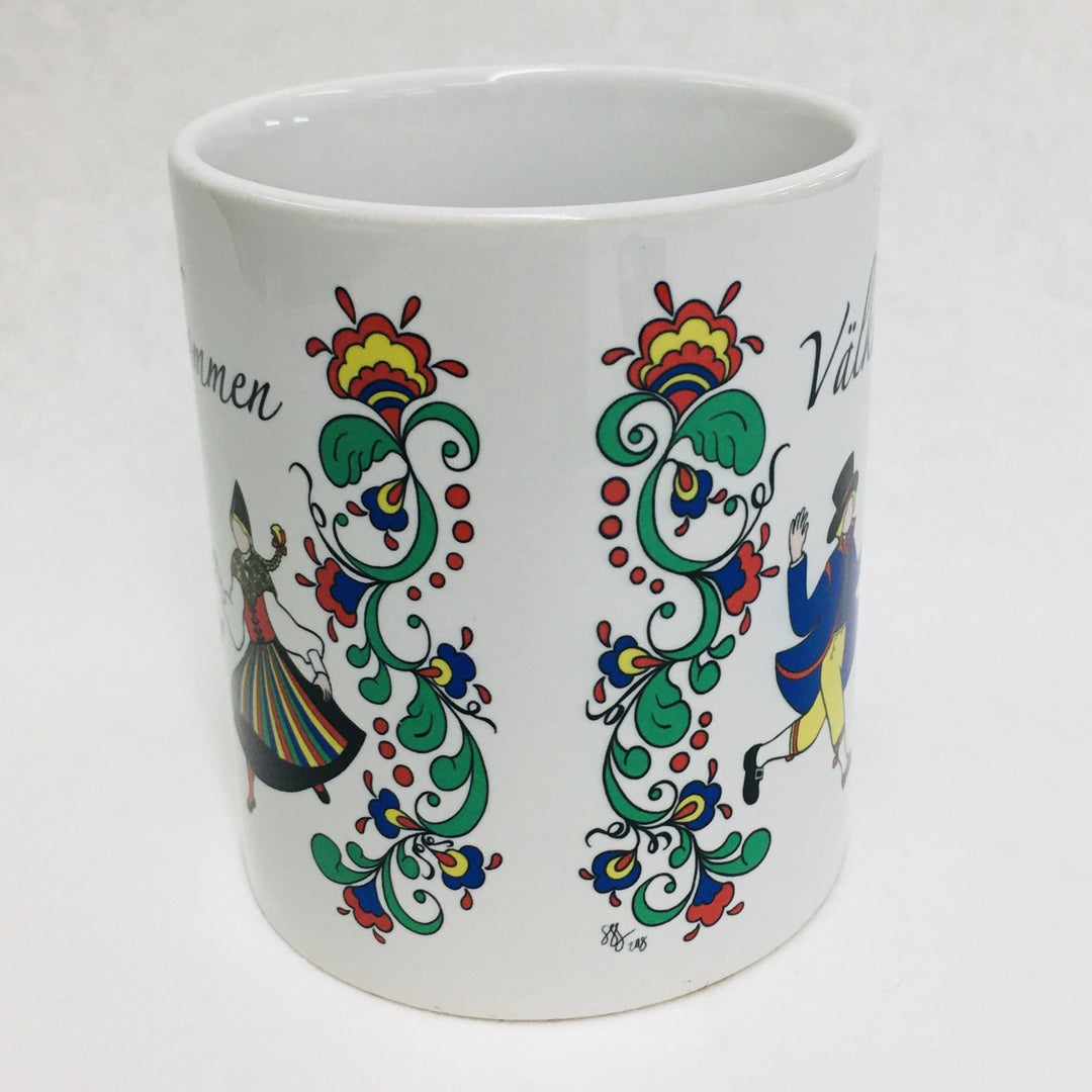 Susan Swanson Swartz Couple & Kurbits with Välkommen coffee mug