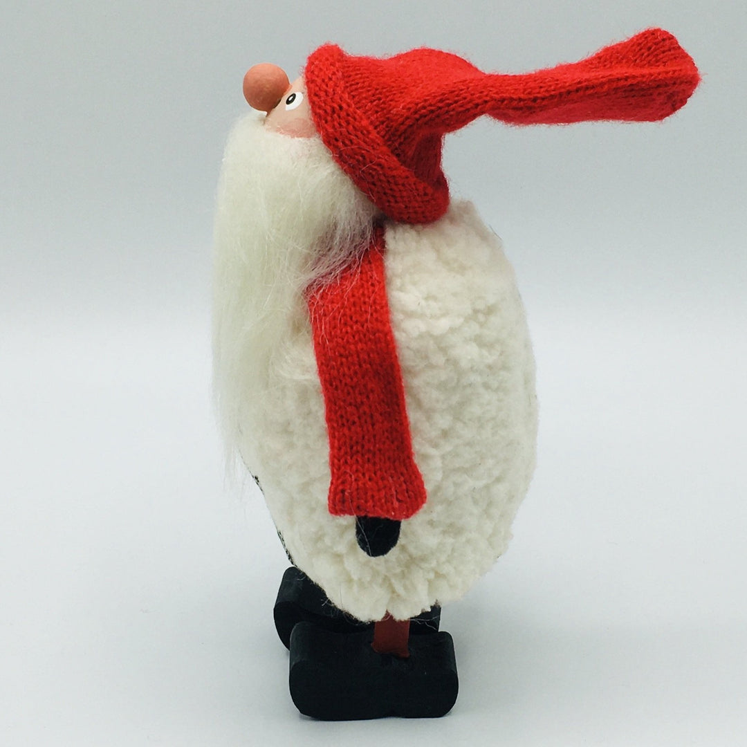 Hand made tomte with white jacket