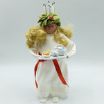 Hand made Lucia with tray of coffee and lucia buns