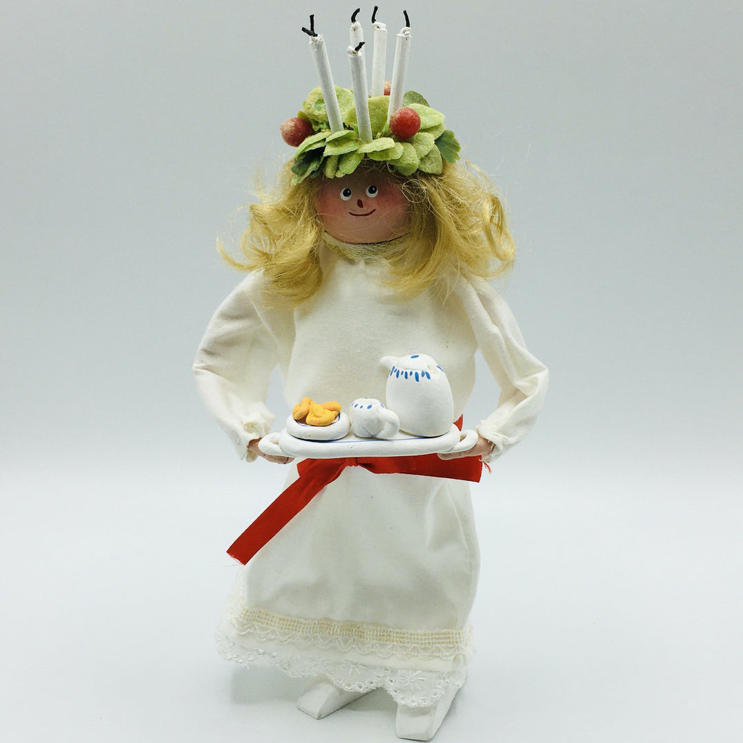 Hand made Lucia with tray of coffee and lucia buns