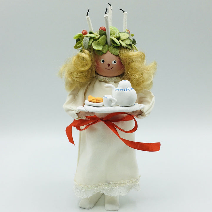 Hand made Lucia with tray of coffee and lucia buns