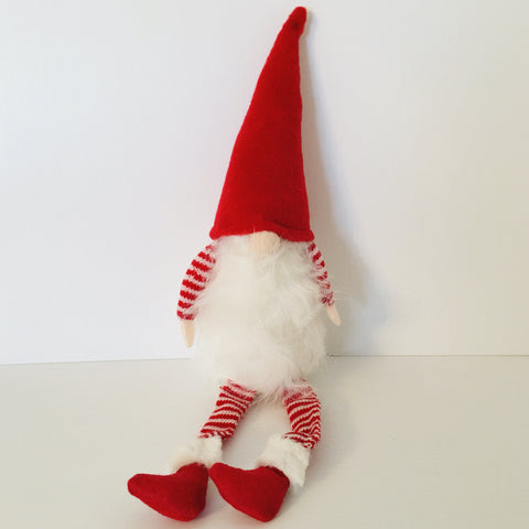 Gnome with red hat and striped sleeves & legs