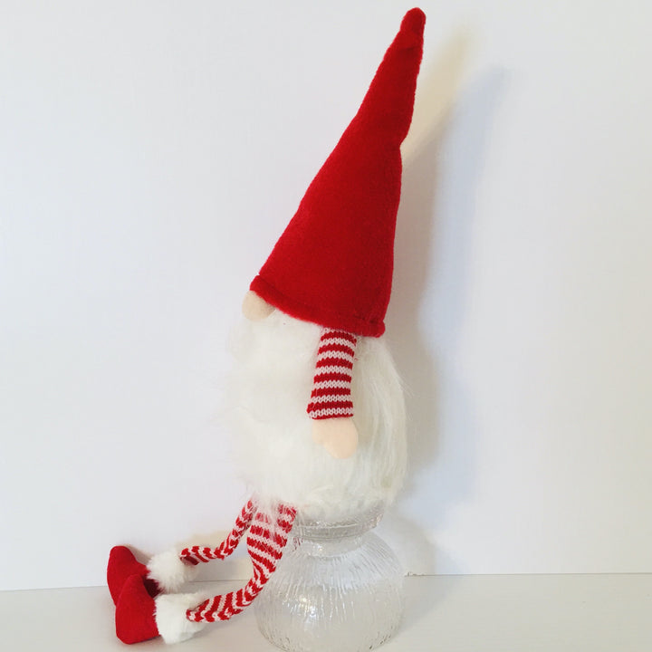 Gnome with red hat and striped sleeves & legs