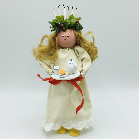 Hand made Lucia with tray of coffee and lucia buns