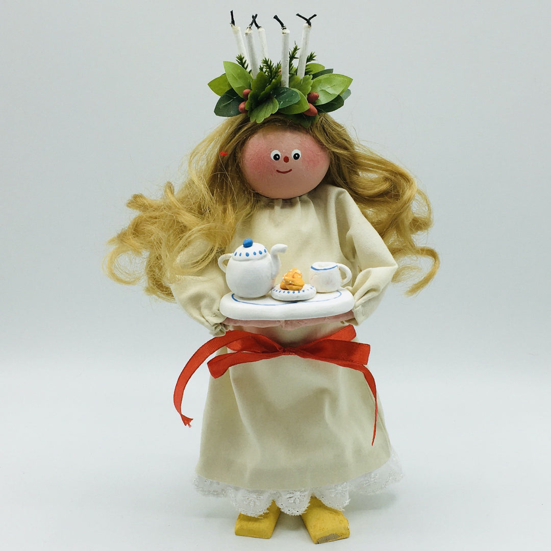 Hand made Lucia with tray of coffee and lucia buns