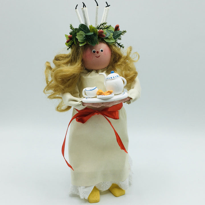 Hand made Lucia with tray of coffee and lucia buns