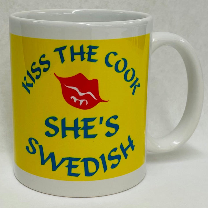 Kiss the Cook She's Swedish coffee mug