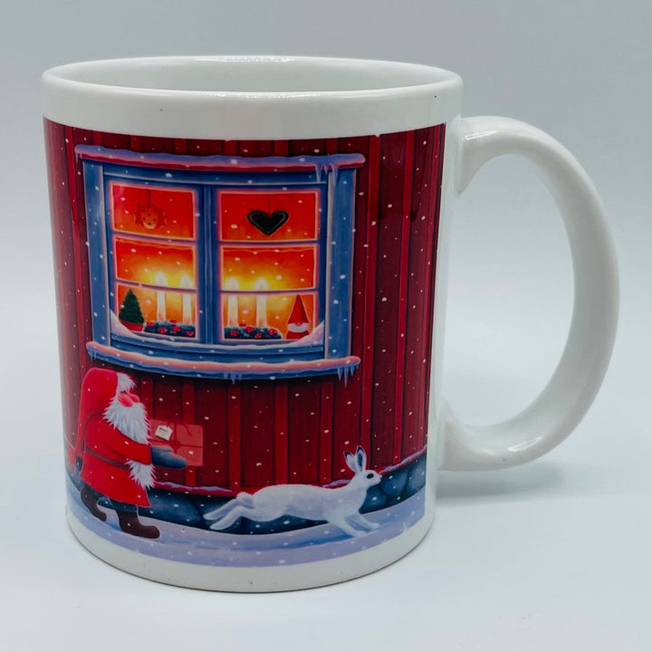 Eva Melhuish Red house with tomte & bunny coffee mug