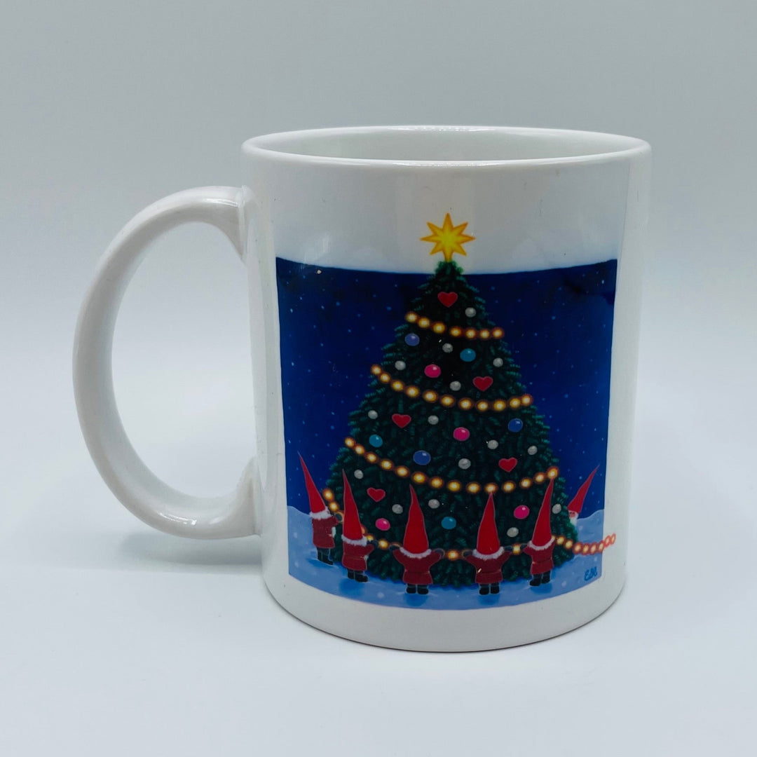 Eva Melhuish Tomte dancing around tree coffee mug