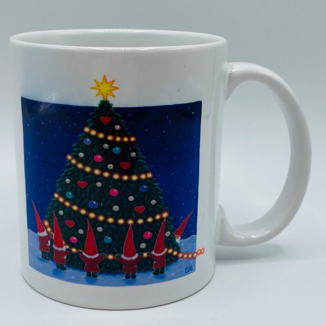 Eva Melhuish Tomte dancing around tree coffee mug