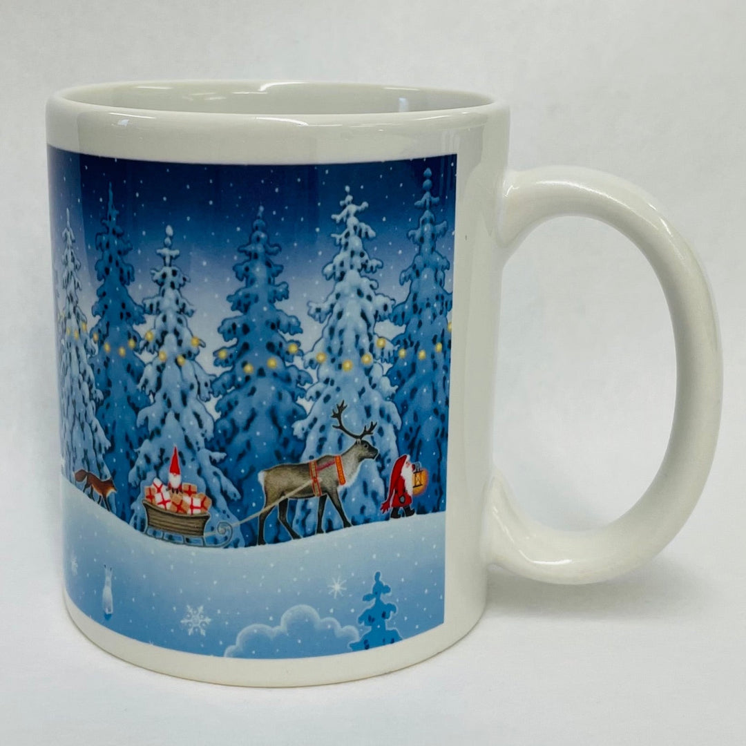 Eva Melhuish Tomte trekking through snow coffee mug