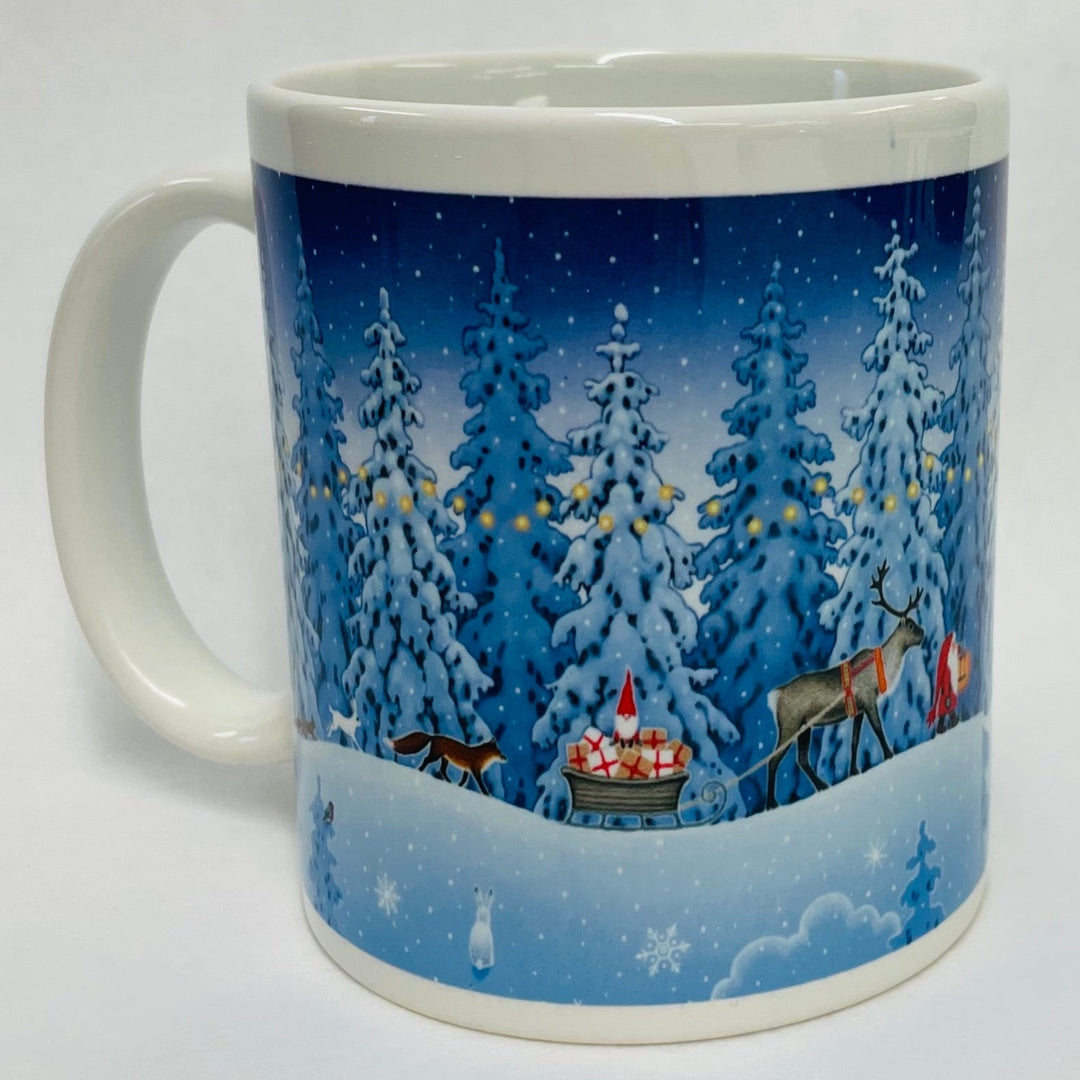 Eva Melhuish Tomte trekking through snow coffee mug