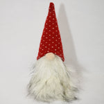 Fuzzy gnome with red knit hat